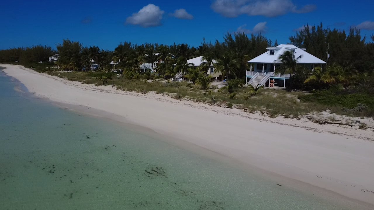 Aerial view of Calypso and the beach at Casuarina Point