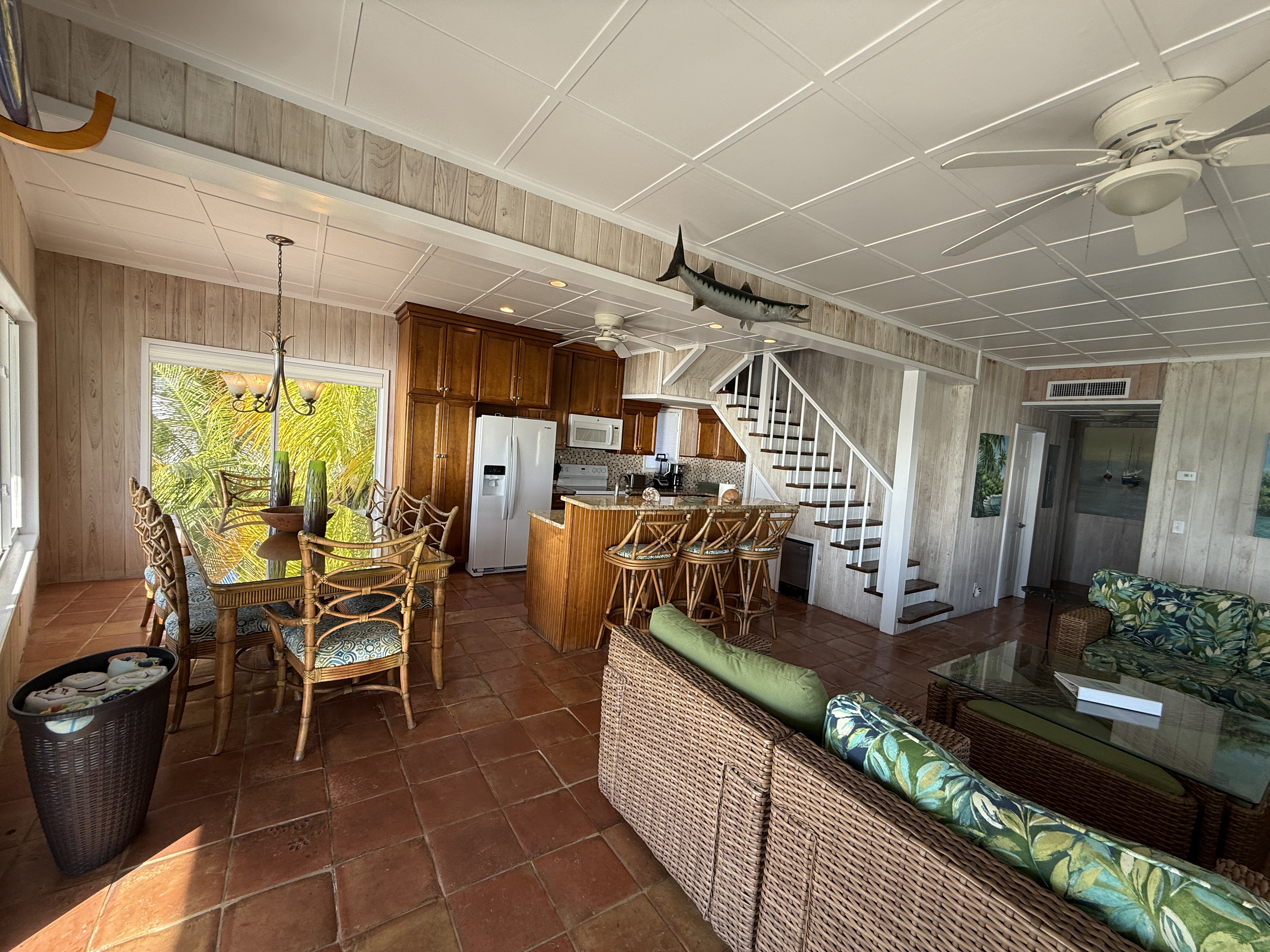 Open great room with kitchen, dining, and large gathering space