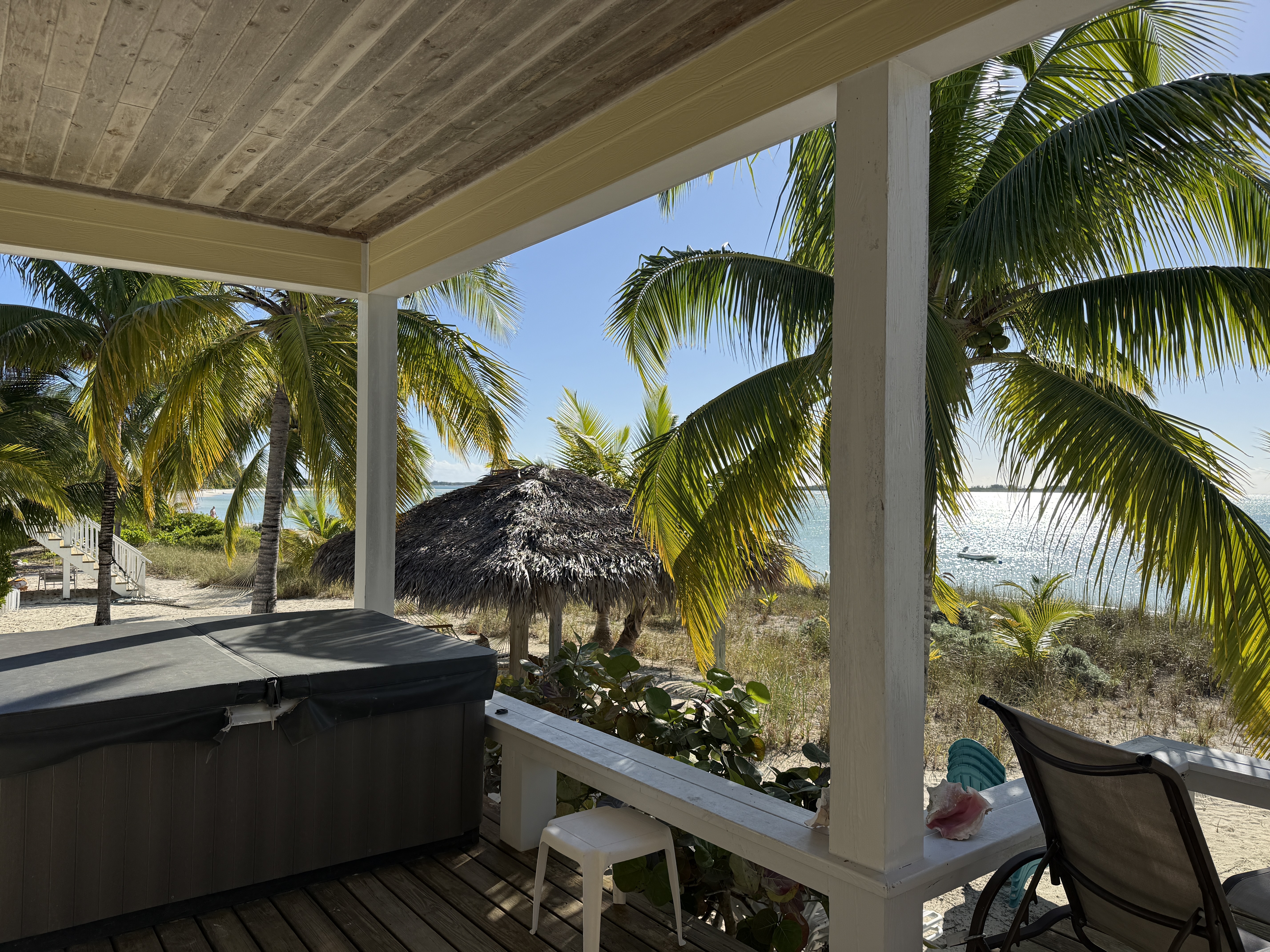 Deck with Vita Spa hot tub and a panoramic view