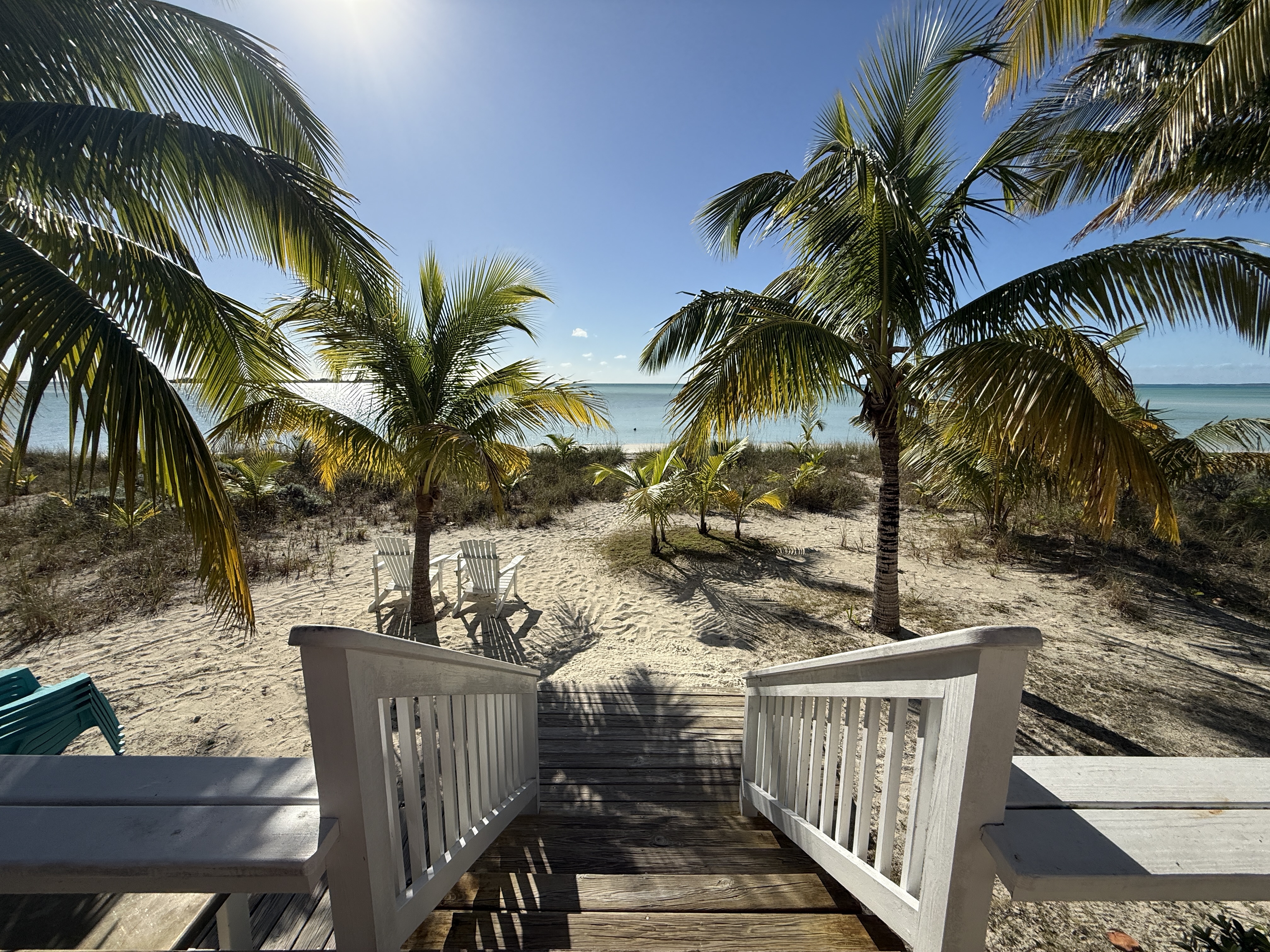 Just a few steps down to the white sand beach