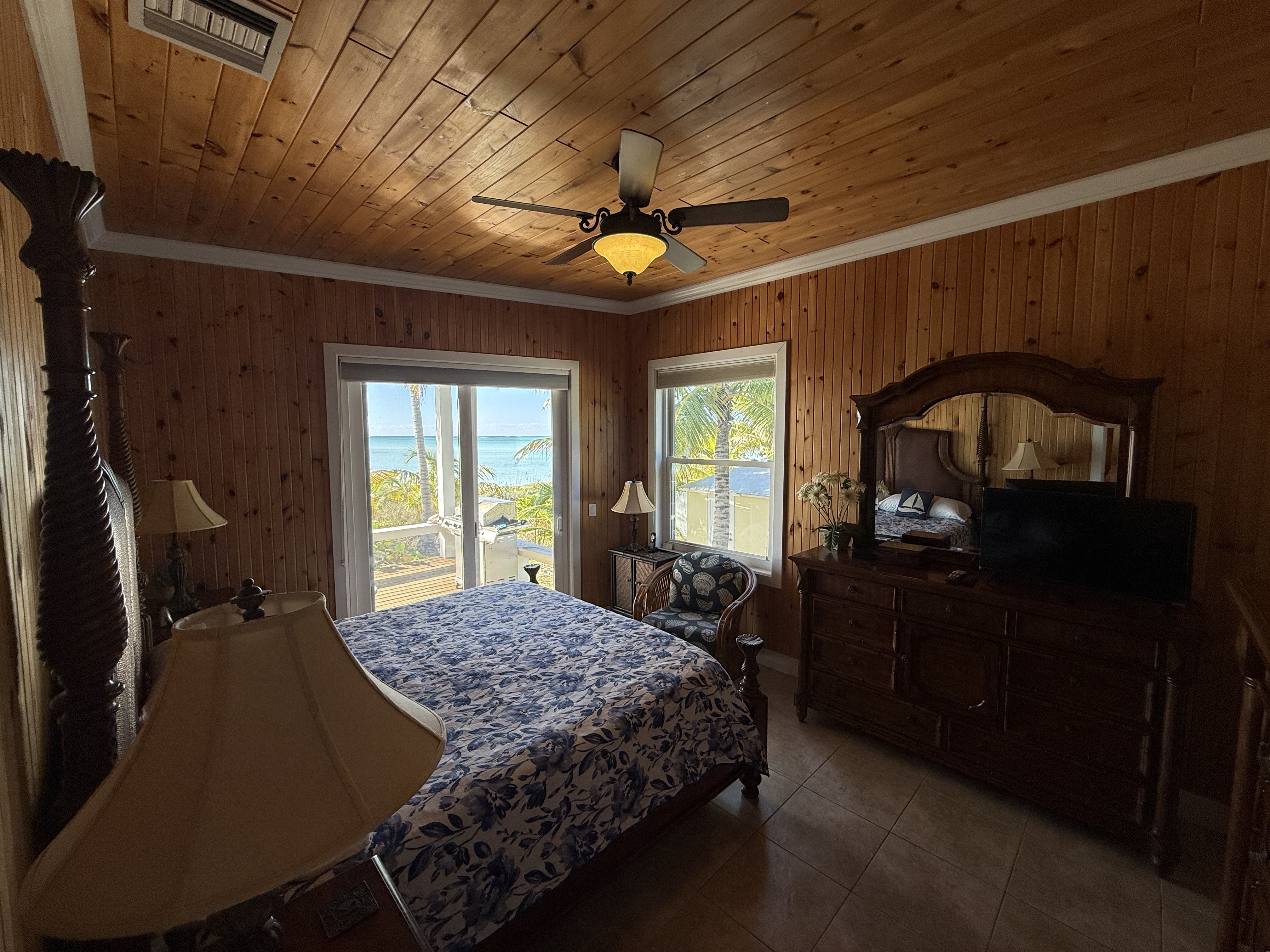 West Master with king bed, ocean view and direct deck access.