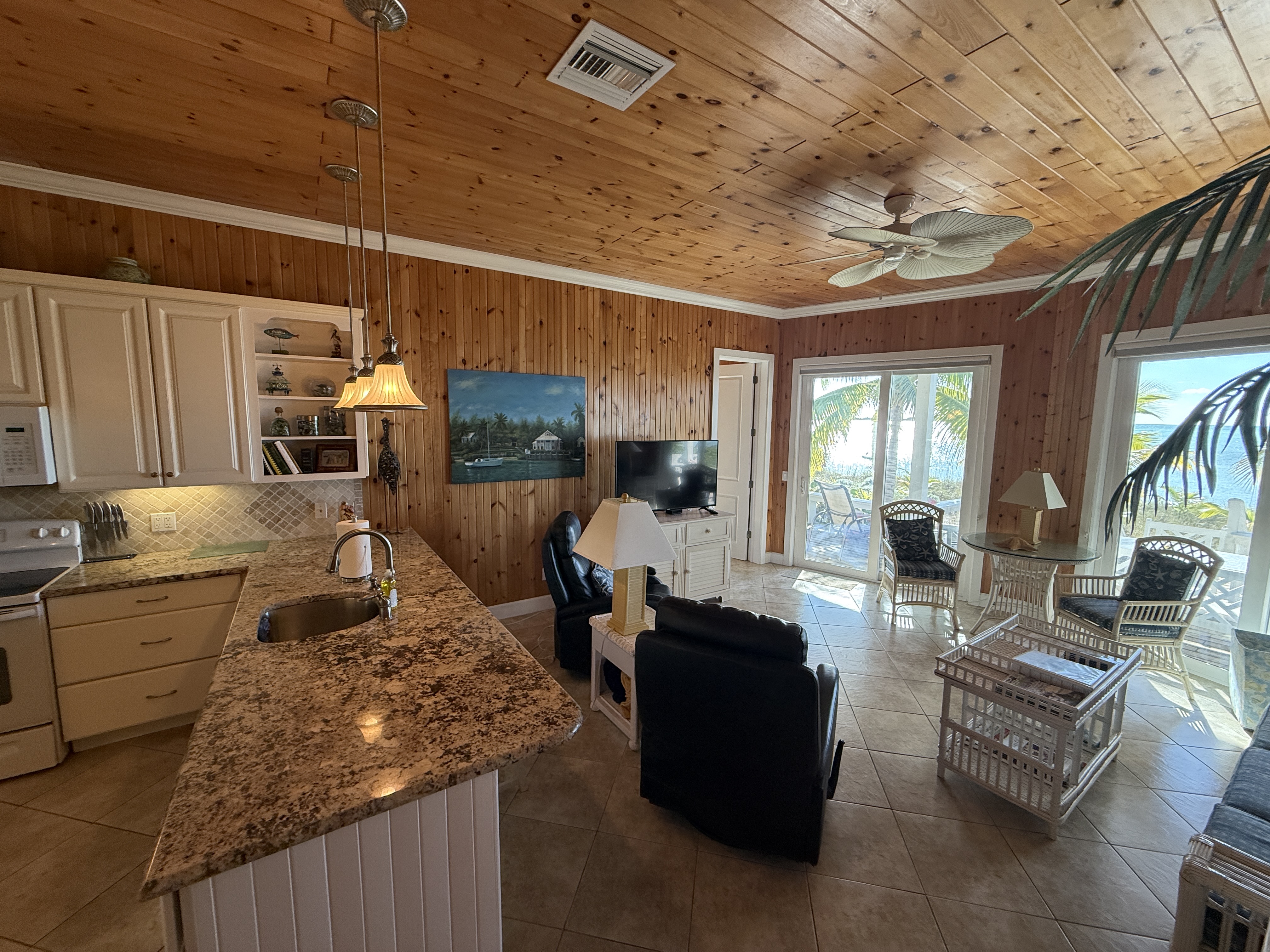 Great room panorama with kitchen and living areas