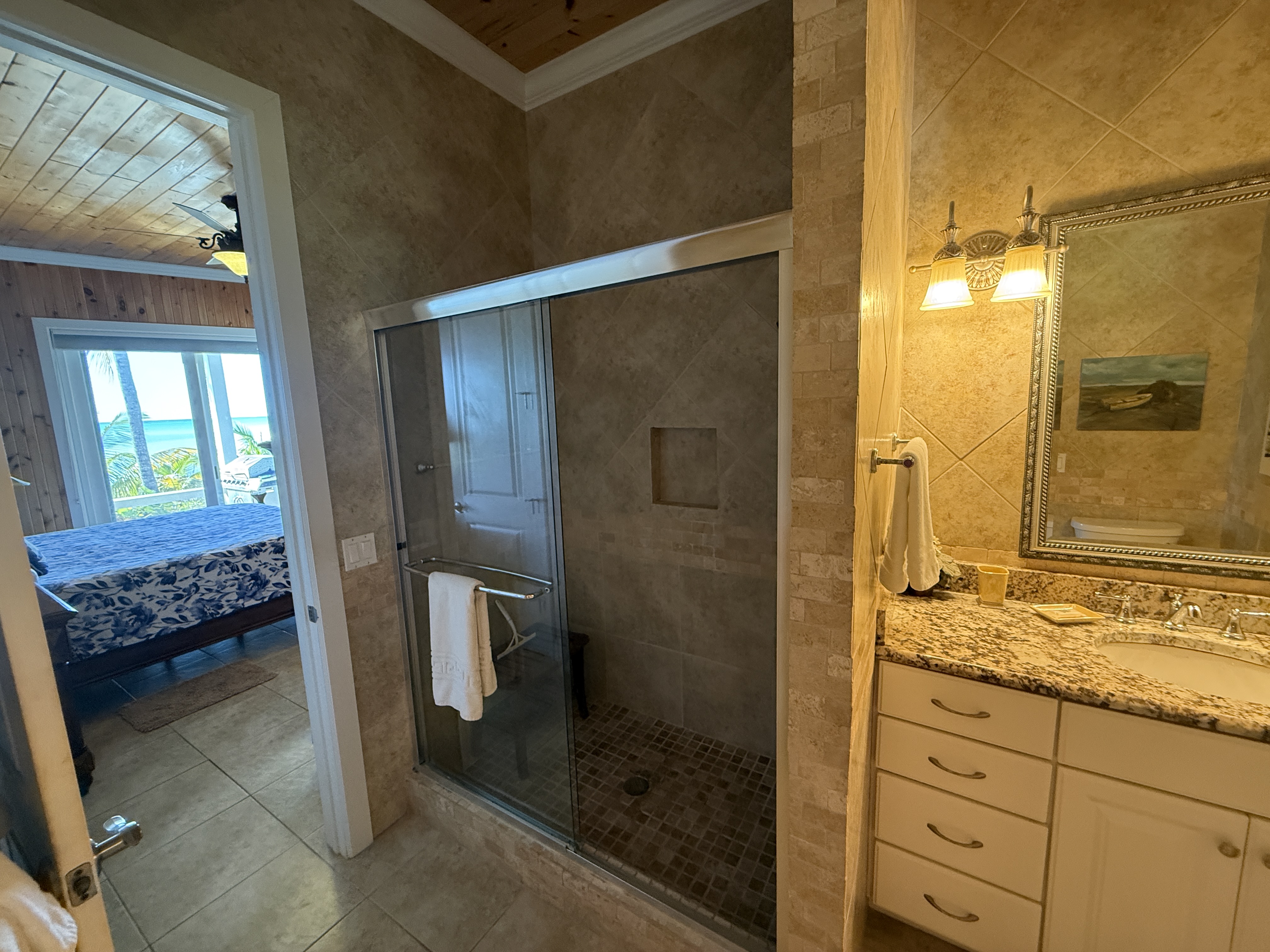 West Master en-suite with walk-in shower and vanity