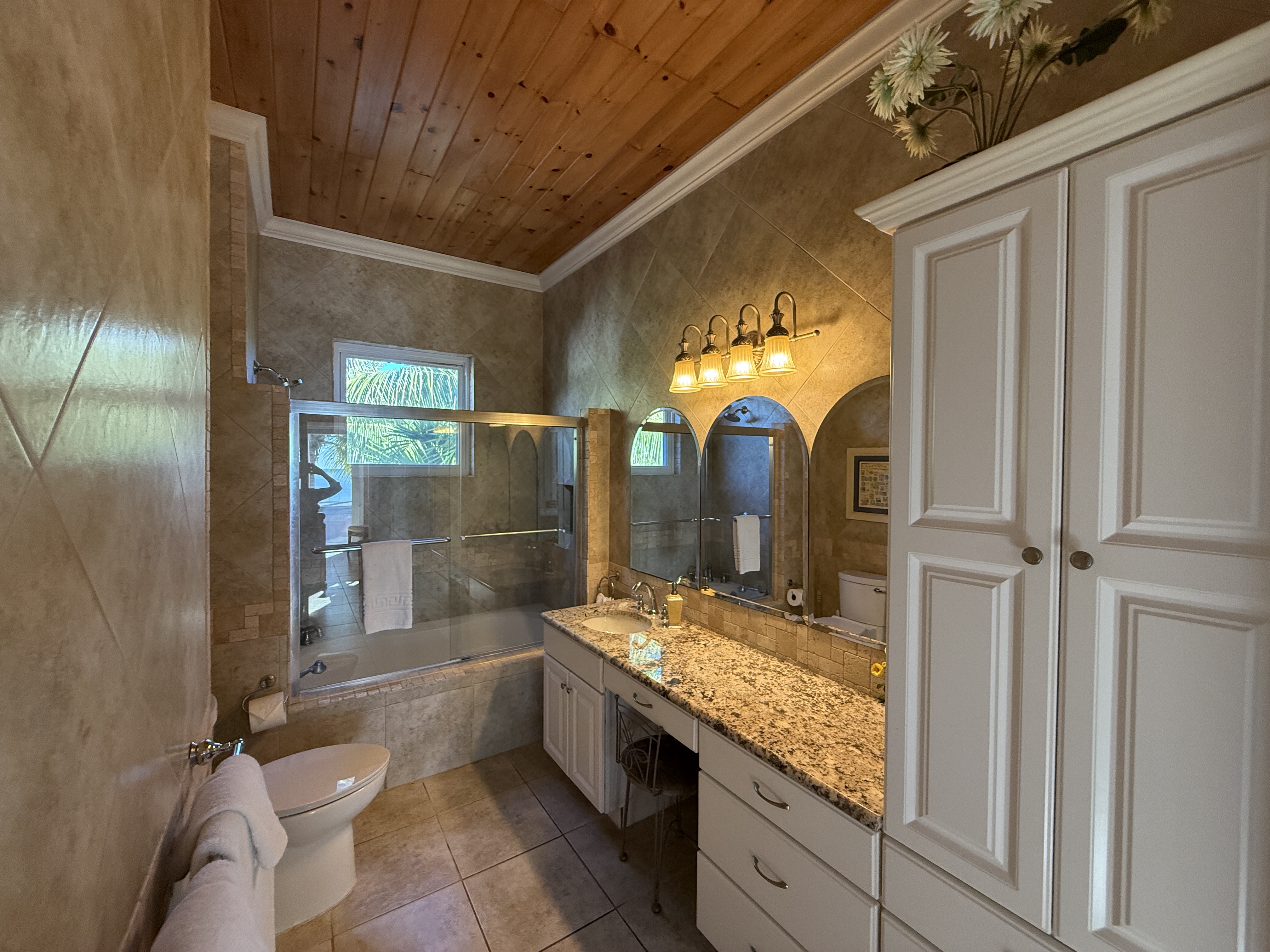 East Master Suite en-suite with large, granite vanity