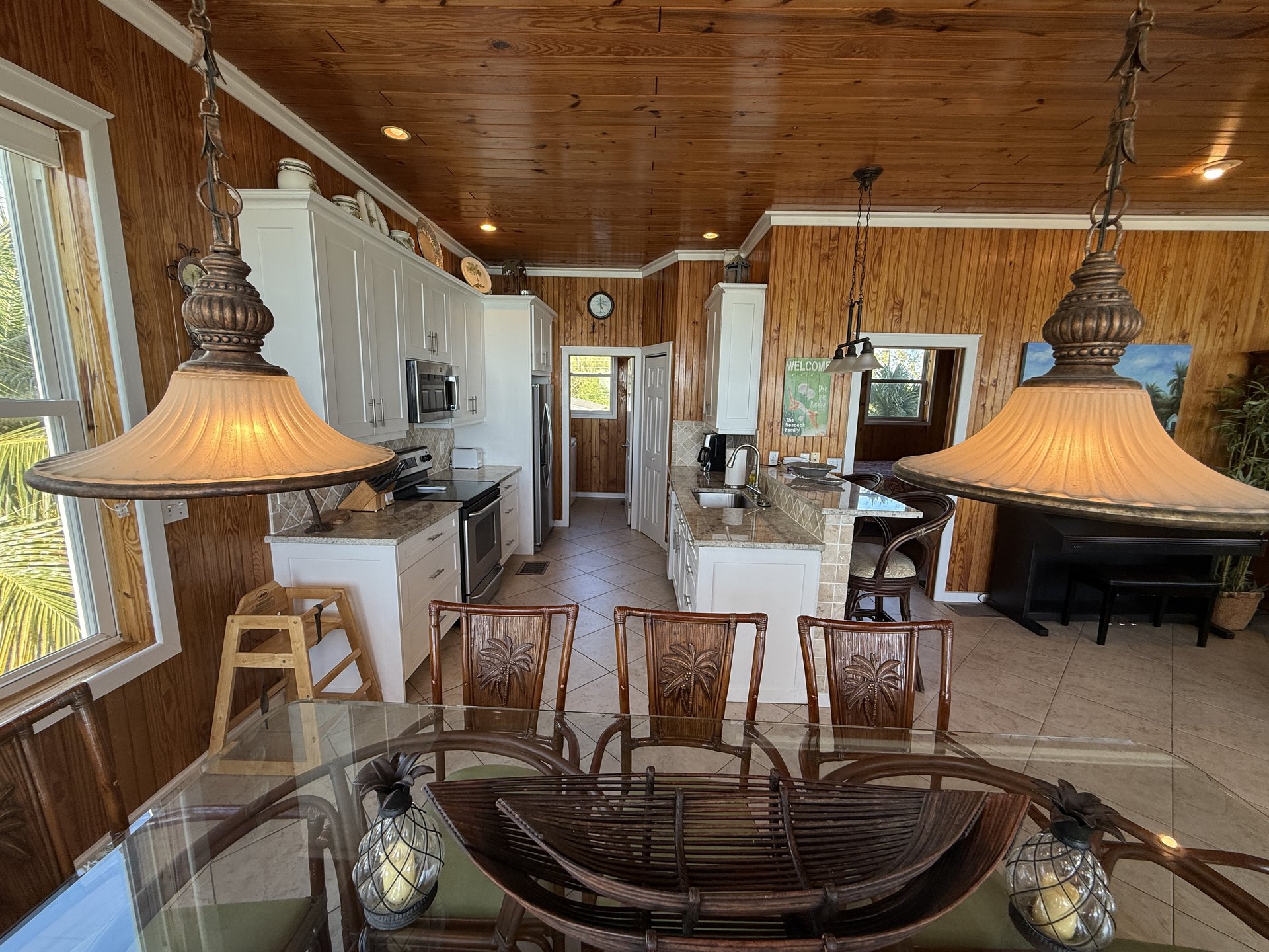 Kitchen and breakfast bar viewed from dining area