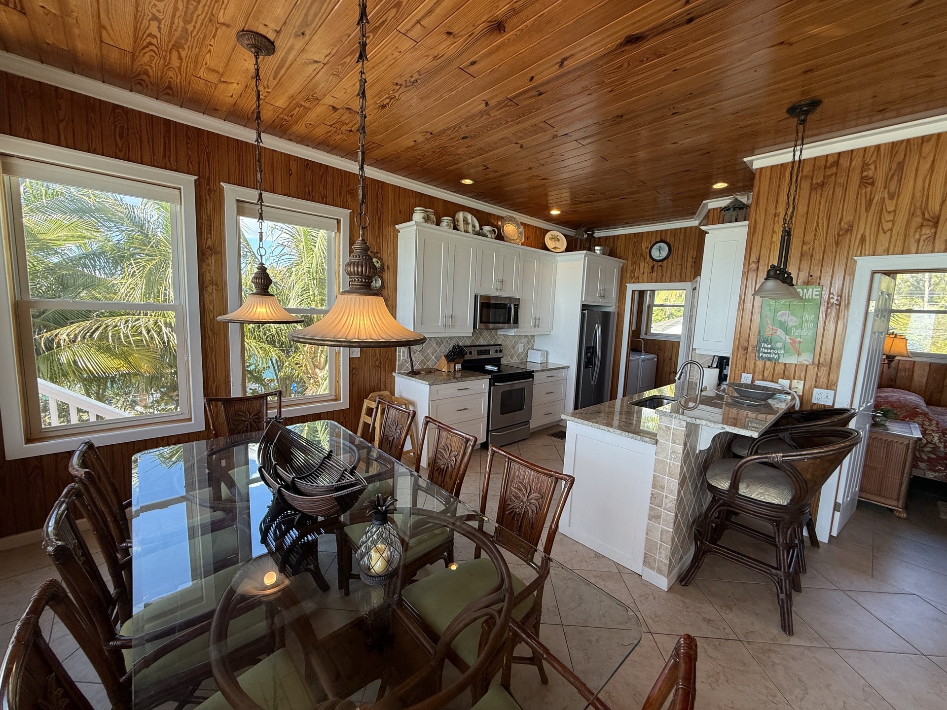 Large dining table with extra seating at the bar