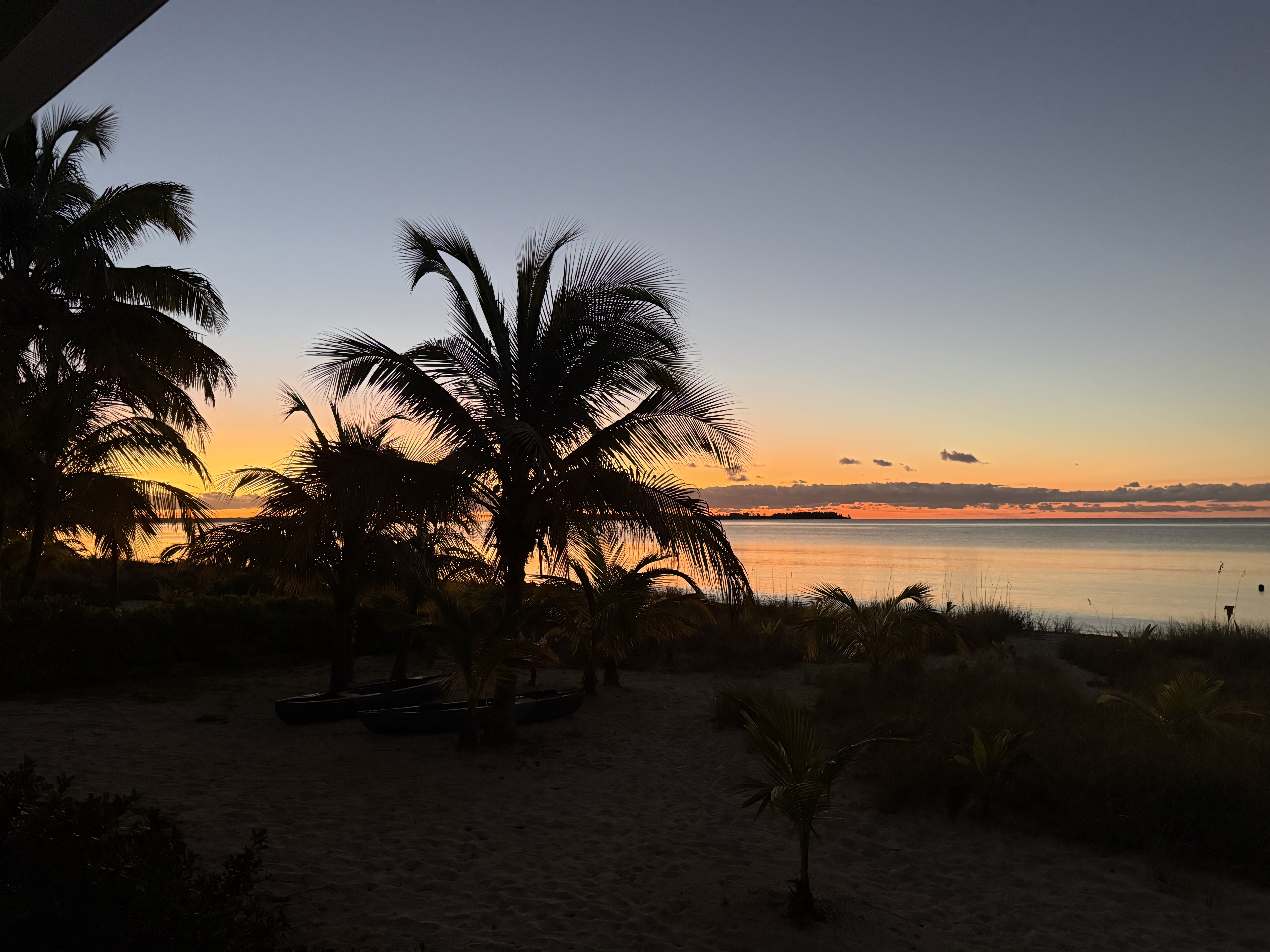 Golden sunrise reflecting in the calm ocean