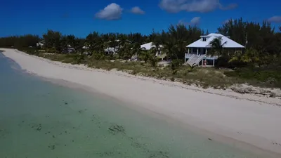 Aerial view of Calypso and the beach at Casuarina Point