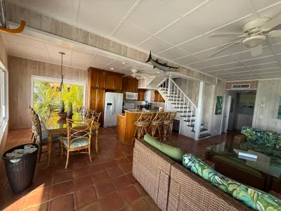 Open great room with kitchen, dining, and large gathering space