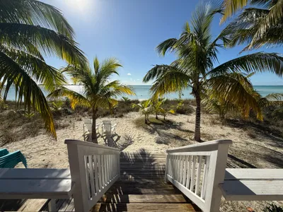 Just a few steps down to the white sand beach