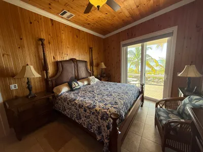 West Master Suite with king bed and ocean view