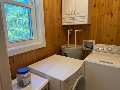 The Laundry Room has a full size washer & dryer and large pantry area