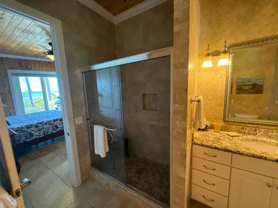 West Master en-suite with walk-in shower and vanity