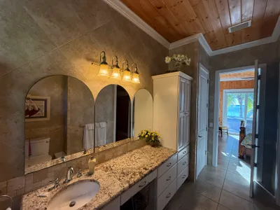 East Master en-suite vanity looking toward the bedroom