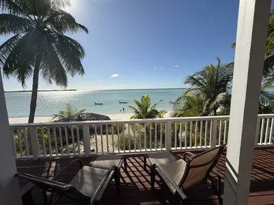 The elevated deck overlooking the Atlantic is the perfect spot to relax and enjoy the ocean view and breeze