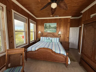 West Master Suite king bedroom with corner ocean views
