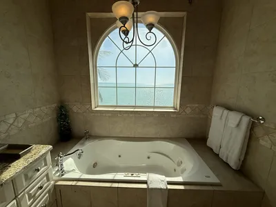 West Master Suite en-suite with large tub and ocean views