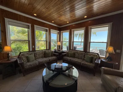 Open living area with 10' ceilings and ocean views