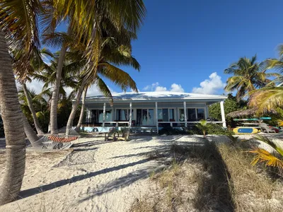 View from the beach with Hammock under the palm trees