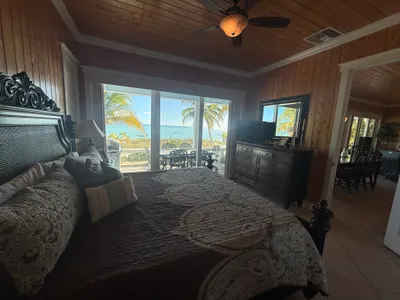 East Master wide view with TV and great room access