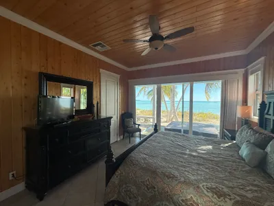 West Master with king bed and huge windows for expansive views