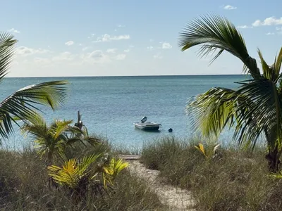 Beach path to turquoise water and your Carolina Skiff