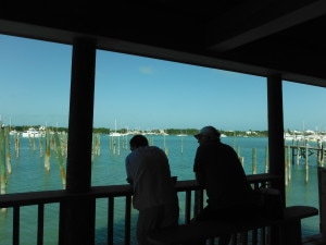 Sitting at the counter facing the harbour, enjoying the view while our food is prepared..