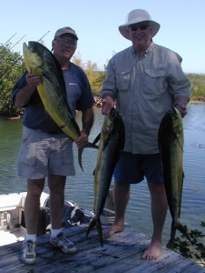 John and Gary showing their catch of Mahi.