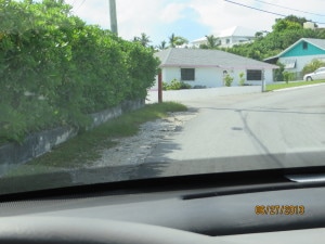 Turn left just this side of the house.