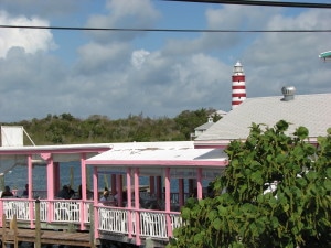 View of a Hope Town Restaurant with a view of the harbour and lighthouse